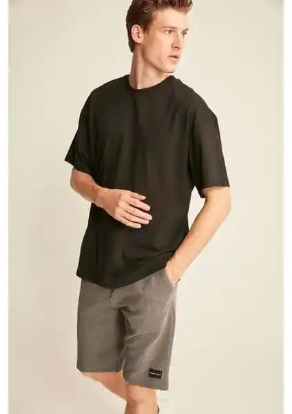 Erkek Organik Pamuklu Tişörtler: Oversize ve Slim Fit Modellerin Karşılaştırması