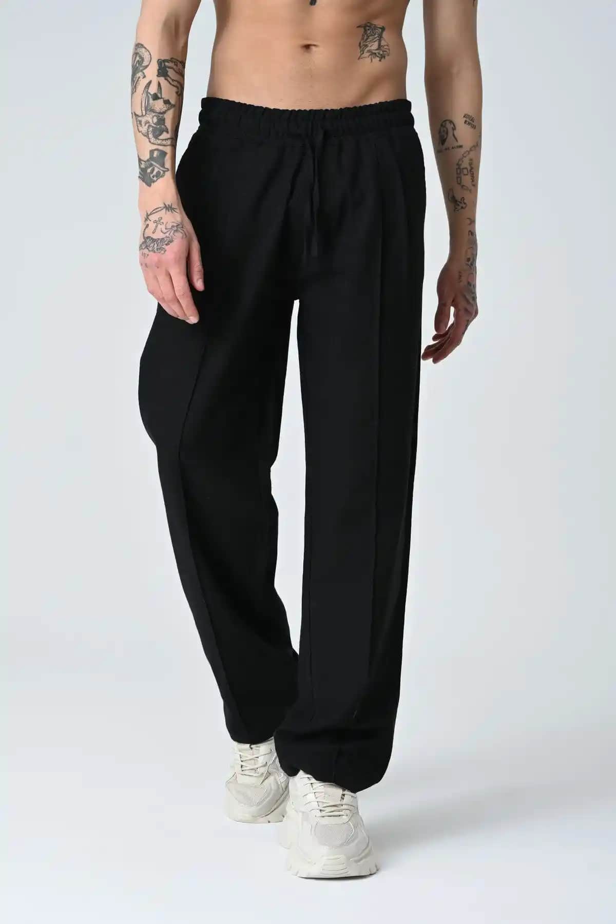 Erkek Bol Kesim Pantolonlar: Rahatlık ve Şıklığın Modern Buluşması