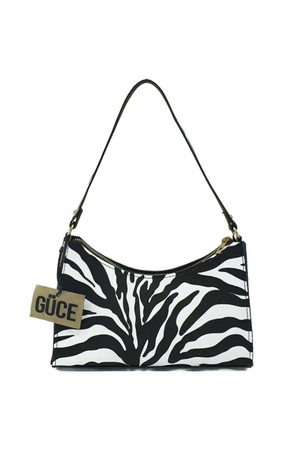 Güce Siyah Beyaz Zebra Desenli Büyük Baget Çanta Modern ve Çok Yönlü Kullanım İmkanı Sunar