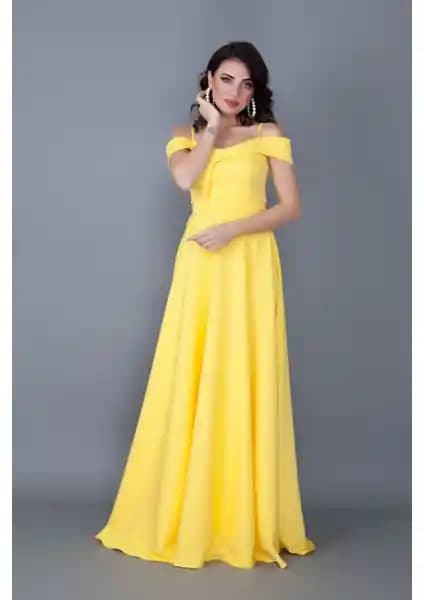 Şık ve Rahat: No48 Sarı Kayık Yaka Düşük Omuz Detaylı Maxi Abiye Elbise Özellikleri