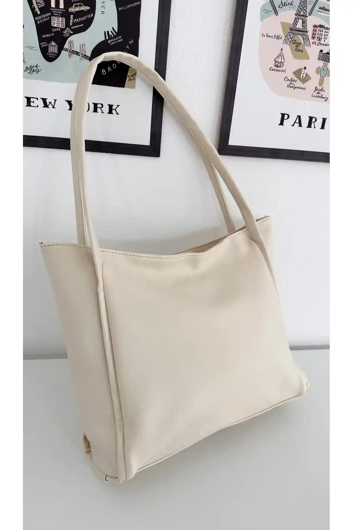 Krem Rengi Kol Çantası Modası ve Stil İpuçlarıyla Zarif Kombinasyonlar