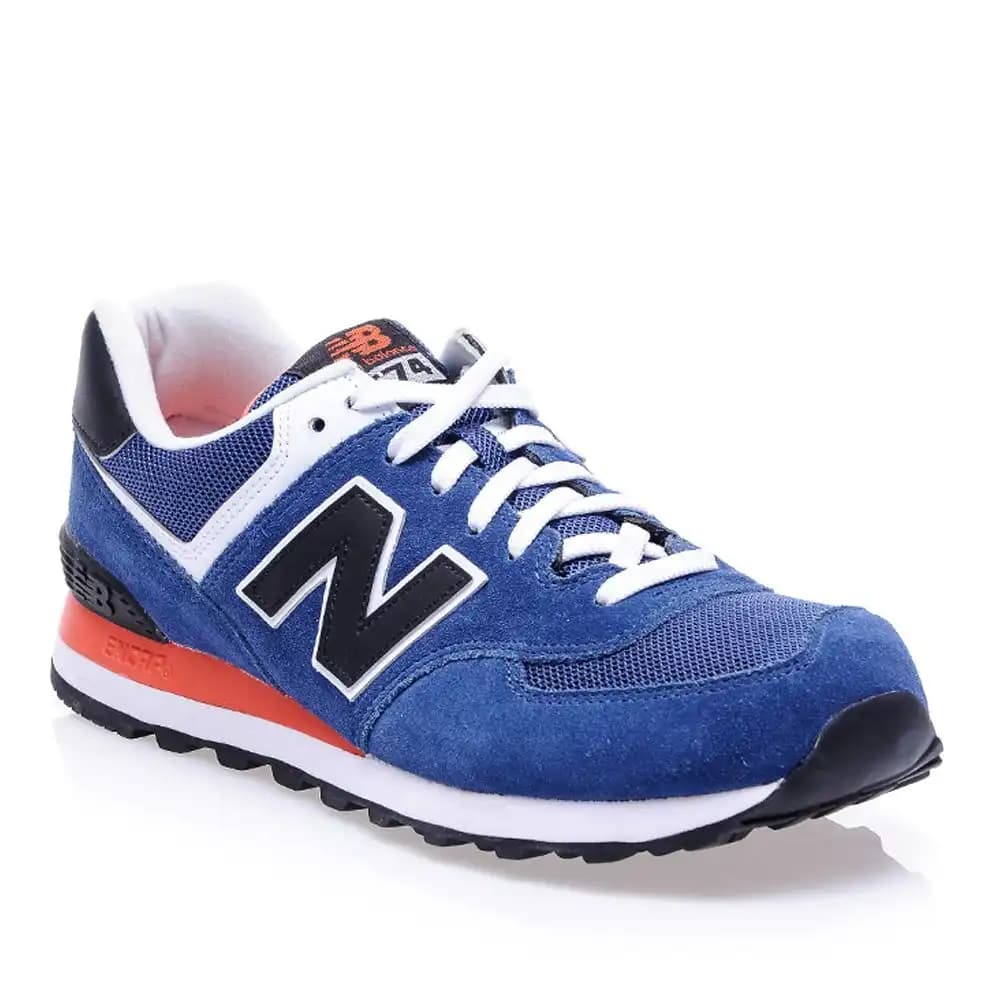 Mavi New Balance 574 ile Şıklık ve Konforu Bir Arada Yakalayın Günlük ve Spor Kullanımına Uygun