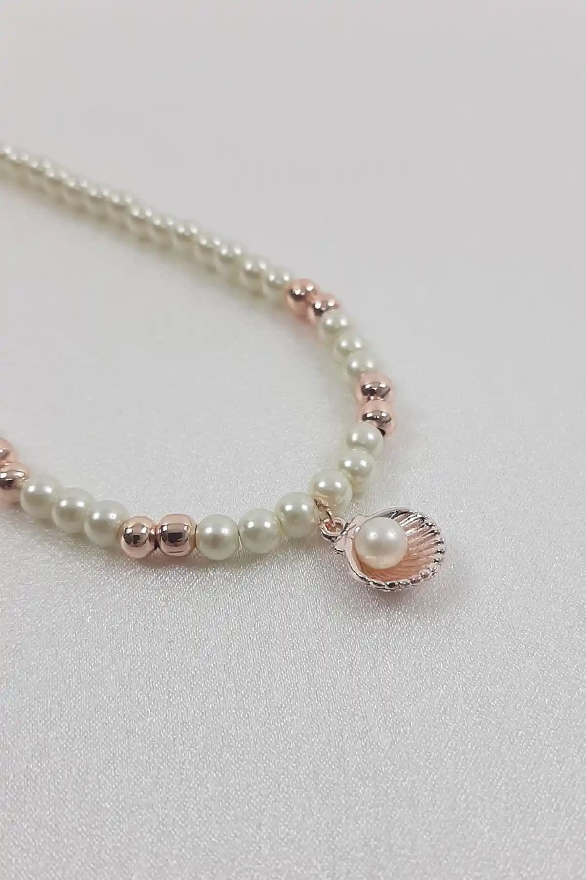 Midye İnci Kolye: Doğal ve Zarif Tasarımlarla Stilinizde Fark Yaratın