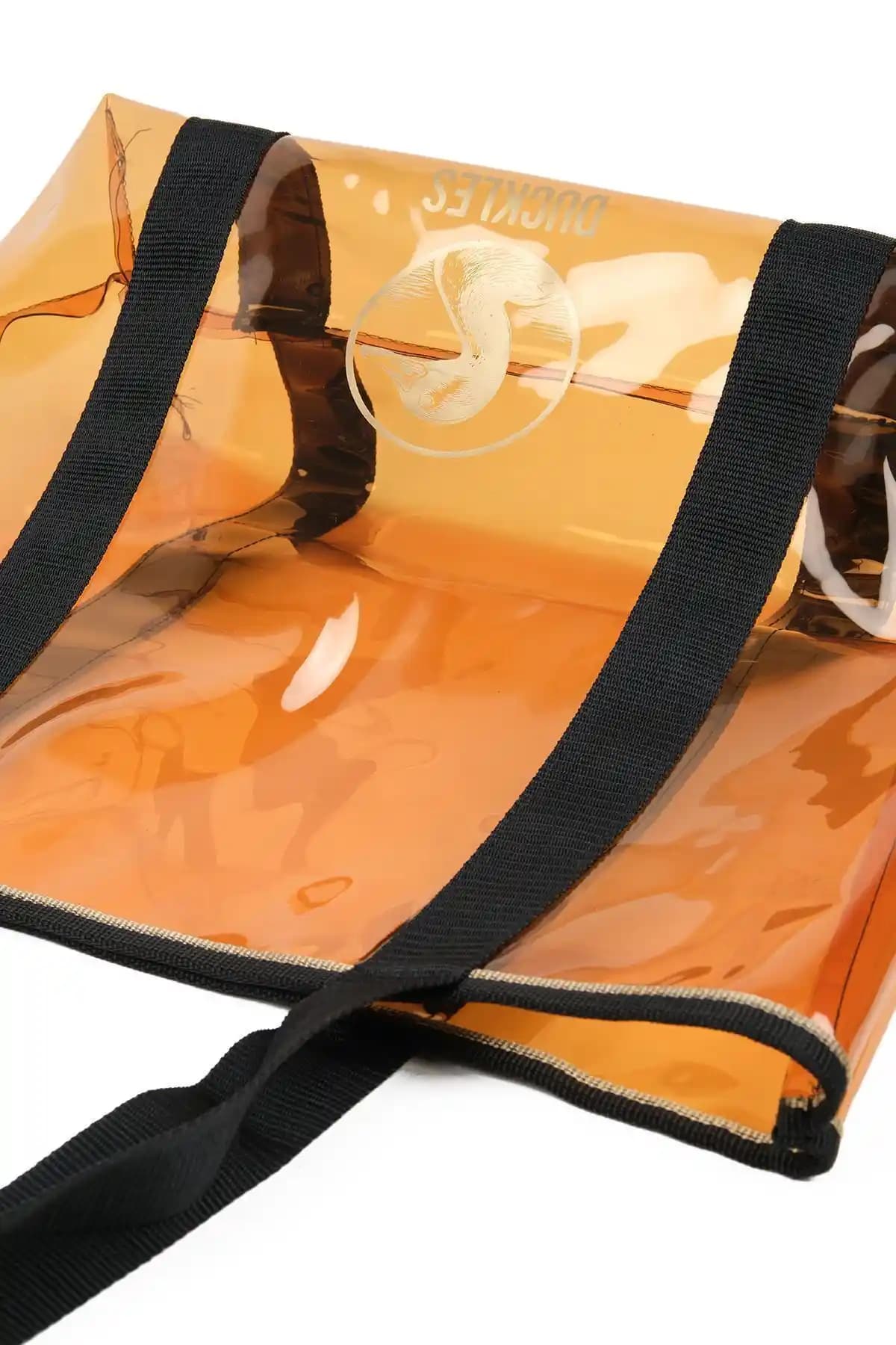 Şeffaf plaj çantası trendi: modern tasarım ve fonksiyonellik ile yaz sezonuna uygun