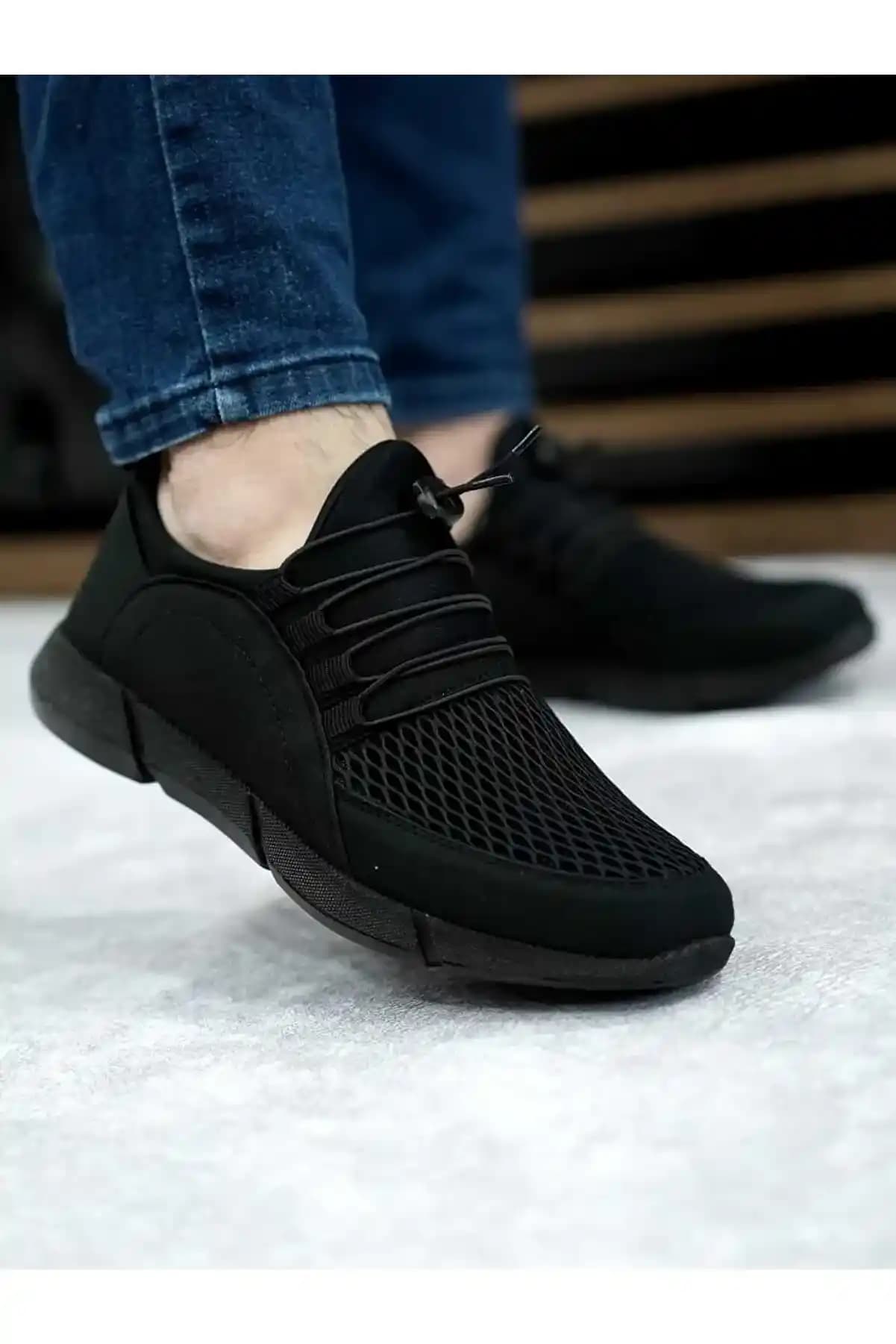 Siyah Erkek Fileli Spor Ayakkabı: Modern Tasarım ve Konforun Buluşma Noktası