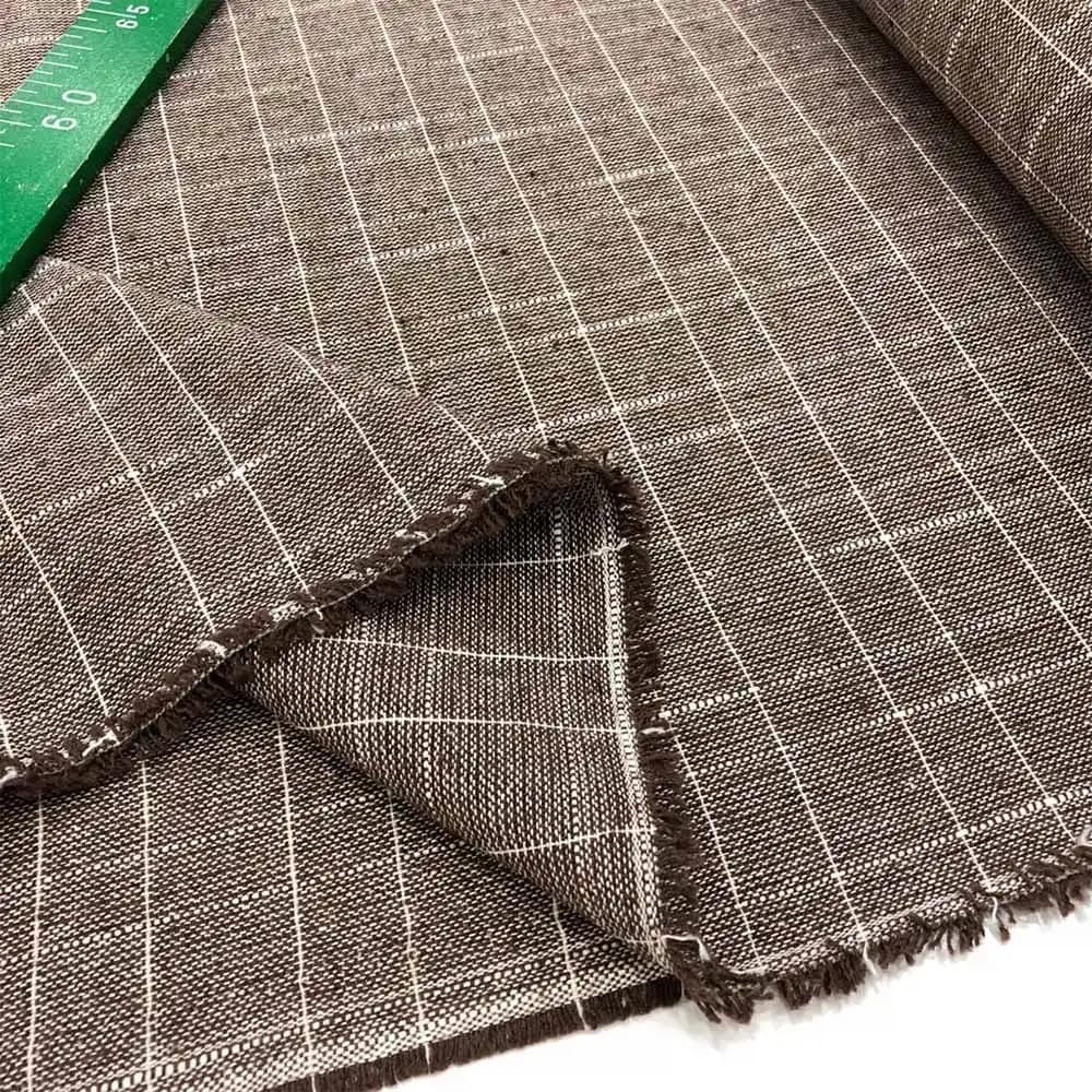 Kahverengi Ekose Kumaş: Moda ve Dekorasyonda Zamansız Şıklık Rehberi