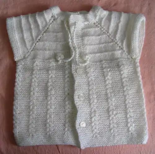 Erkek Bebek Yelekleri: Malzeme, Tasarım ve Fonksiyonellik Üzerine Değerlendirme