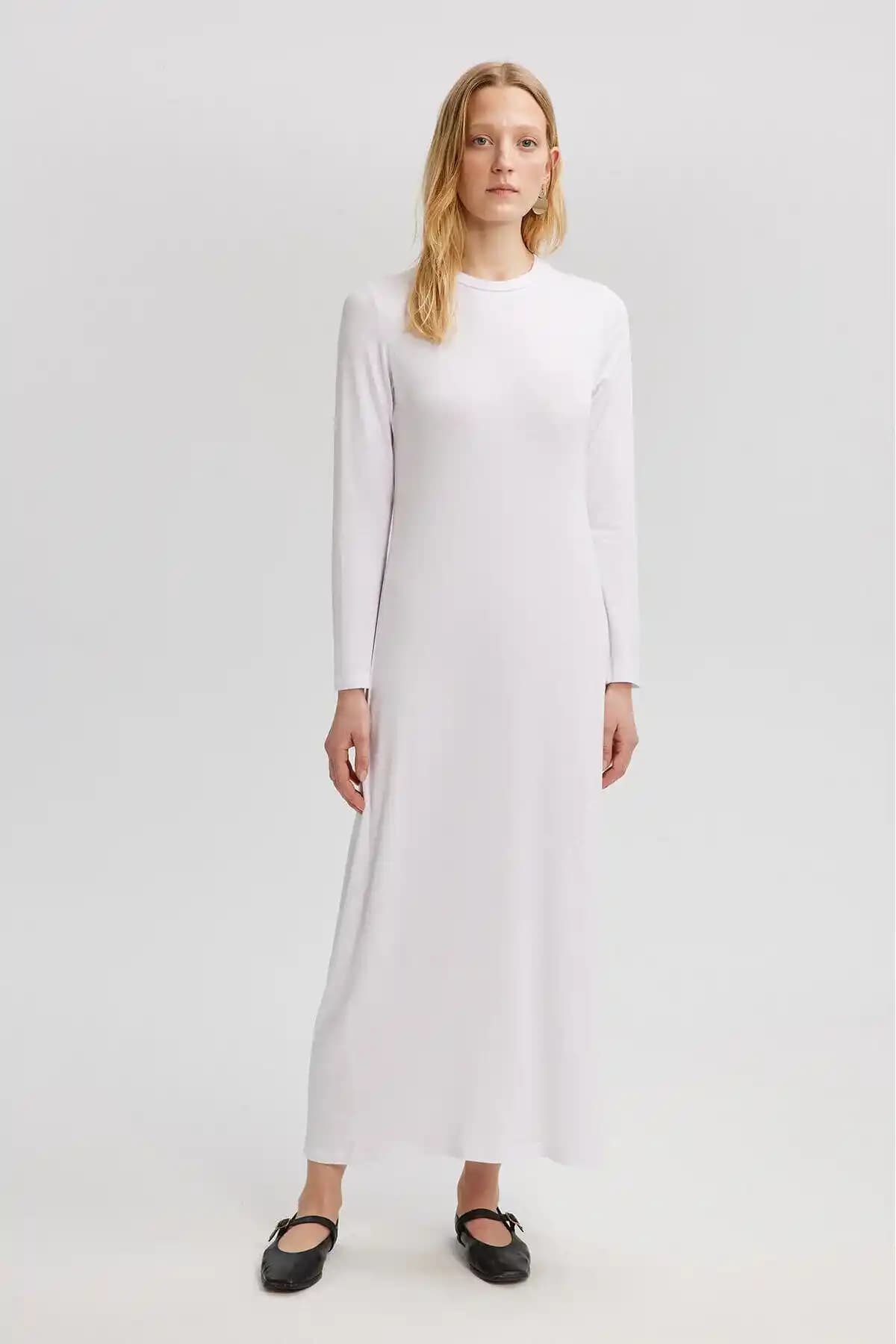 Uzun Kollu Astar: Moda ve İşlevsellik Arasında Kıyafetlerde Önemli Bir Detay