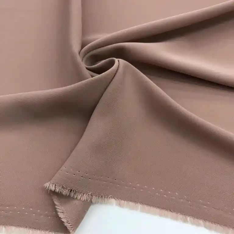 Moda Dünyasında Sütlü Kahve Kumaş: Şıklık ve Doğallığın Uyumlu Buluşması