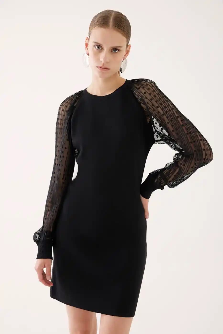 Siyah Elbise Diz Altı Modası: Zamansız Şıklık ve Kombinasyon İpuçları