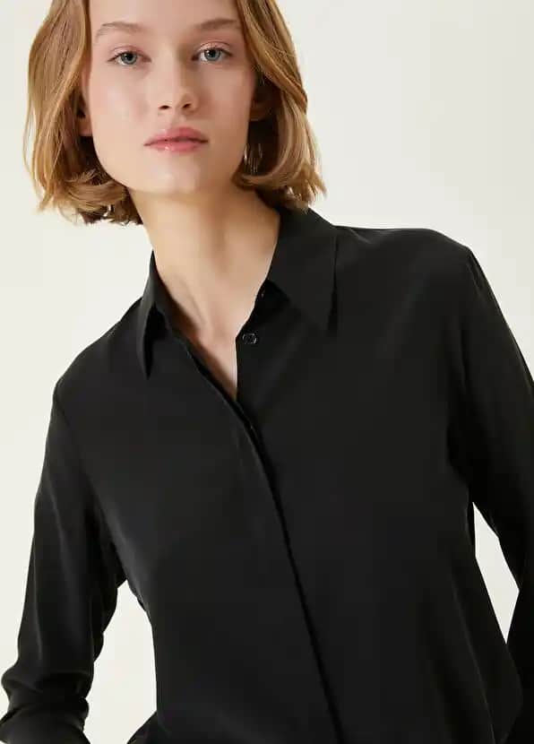 Siyah İpek Gömlek: Moda Dünyasında Zarafetin ve Çok Yönlülüğün Simgesi