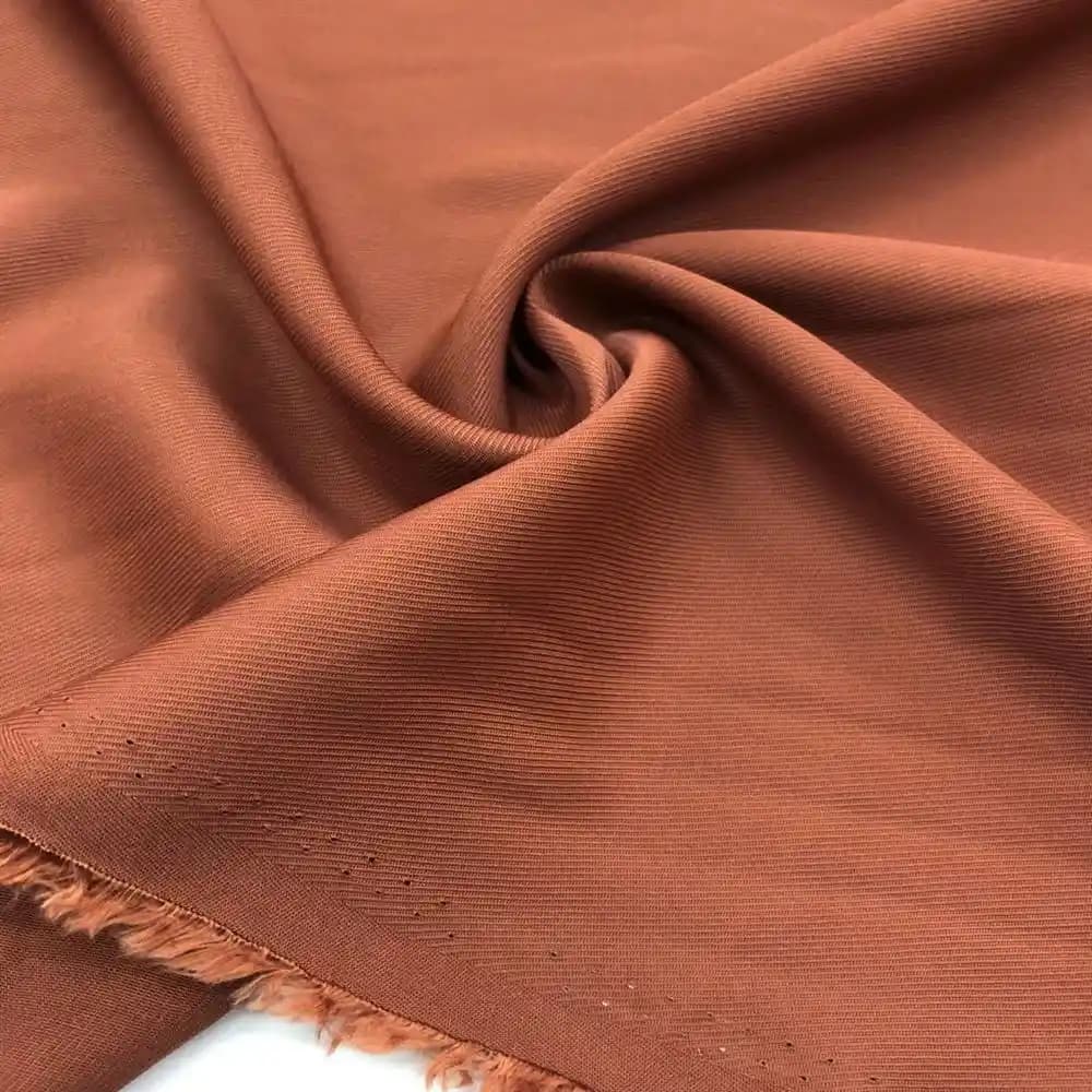 Taba Rengi Kumaşın Moda Dünyasındaki Yeri ve Stil Önerileri