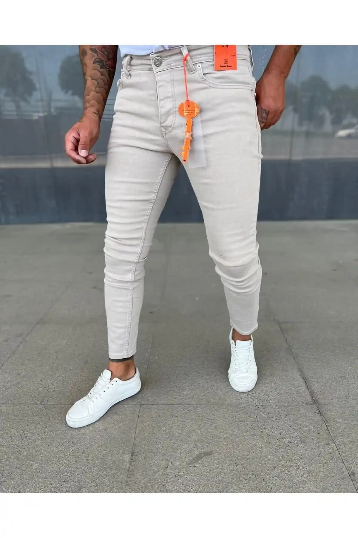 Taş Rengi Kot Pantolon: Şıklık ve Çok Yönlülük Sunan Moda Parçası