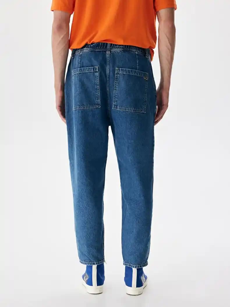 Yüksek Bel Erkek Jean Modası: Stil ve Konforu Bir Arada Sunan Trend Parça