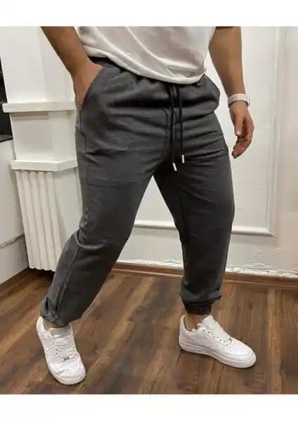 DAXİS Sportwear Unisex Koyu Gri Kelepçe Paça Eşofman: Konfor ve Tasarım Dengesi