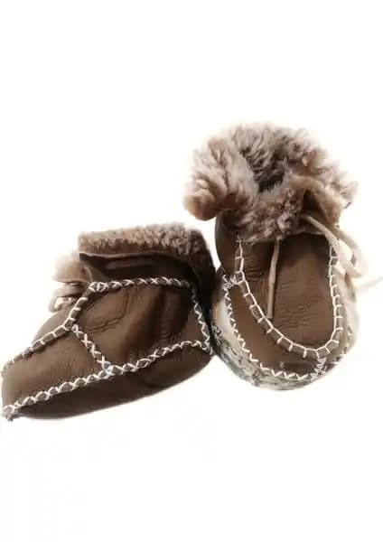 10Ten Kuzu Derisi Bebek Patik: Sıcacık ve Şık Bir Kış Ayakkabısı Seçeneği