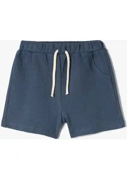 Koton Erkek Bebek Şortları Karşılaştırması: Beli Lastikli ve Dokulu Modellerin Özellikleri