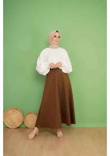 Cng Moda Puf Scuba Siyah Etek: Modern Tasarım ve Yüksek Kalite Kumaş Özelliğiyle Şıklık