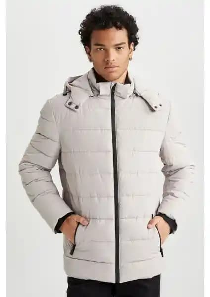 DeFacto Rüzgar Geçirmez Şişme Mont Erkekler İçin Modern ve Kullanışlı Kış Kıyafeti