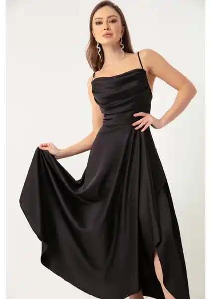 Lafaba Siyah Kadın Midi Abiye Elbise Şık ve Modern Tasarımıyla Dikkat Çekiyor