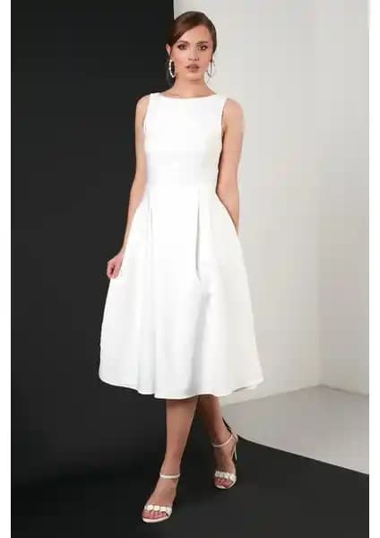 Lela Bisiklet Yaka Cepli Midi Elbise: Şıklık ve Rahatlık Sunan Çok Yönlü Tasarım