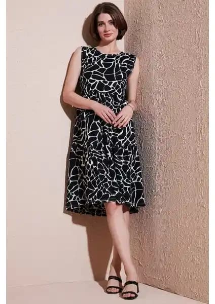 Lela Desenli Kolsuz Midi Elbise Kadınlar İçin Şık ve Rahat Günlük Kullanım Elbisesi