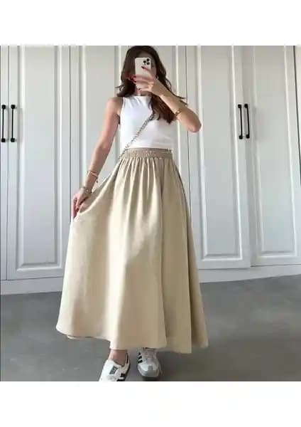 Moda Ulu Çift Cepli Beli Lastikli Uzun Etek: Şıklık ve Fonksiyonellik Bir Arada