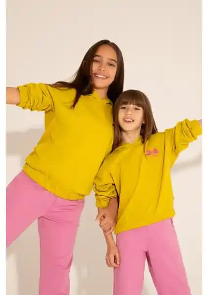 U.S. Polo Assn. Kız Çocuk Fıstık Yeşili Kapüşonlu Sweatshirt: Rahat ve Şık Günlük Giyim Seçeneği